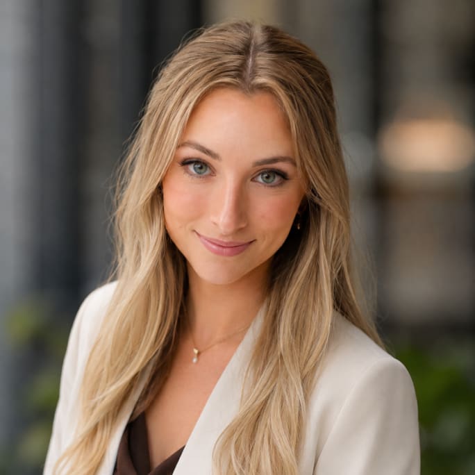 A professional portrait of Samantha Kobussen Gerrits.