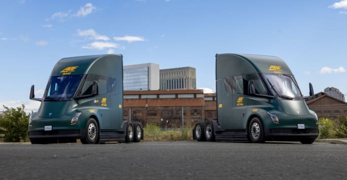 Two Tesla Semi electric heavy duty trucks with ABF branding