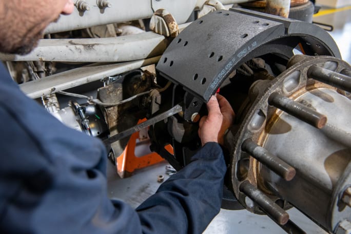 picture of a technician checking a drum brake