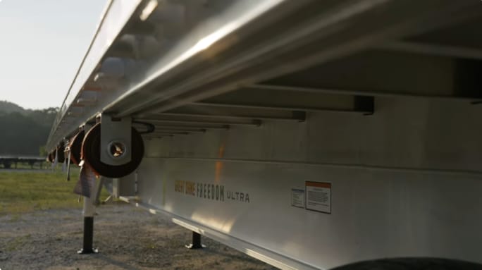 Side of aluminum flatbed trailer from Great Dane