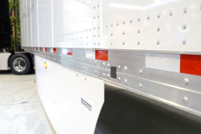 Closeup of side of trailer with blind spot monitoring camera