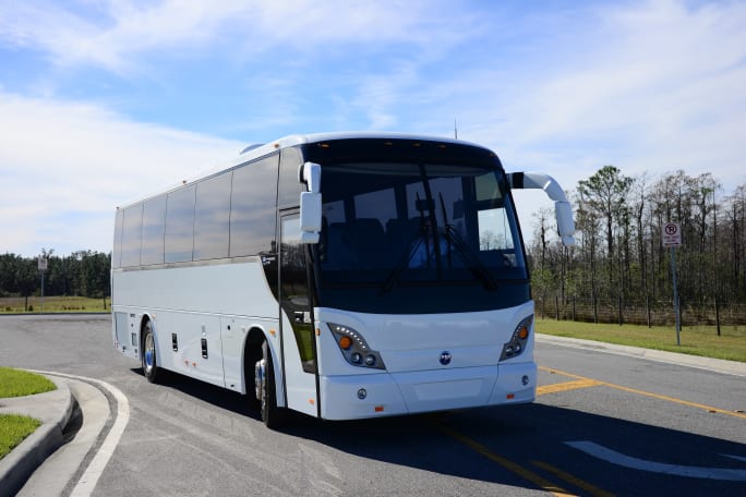 A motorcoach on the road.