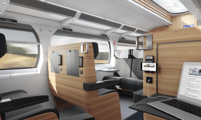 Rendering of the inside of a passenger rail with user interfaces.