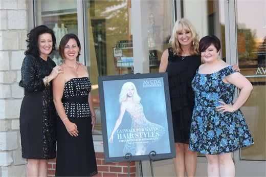 The team from Five Senses Spa and Salon in Peoria, IL, all dressed up for Catwalk for Water.