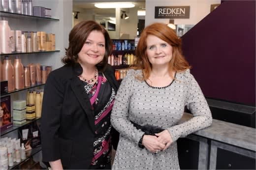 The owners of Salon Allure in Huntsville, AL.