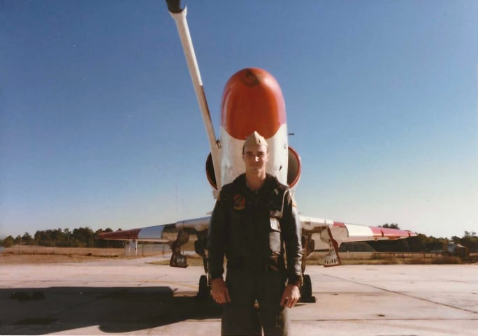 Martin Staples posing in front an A-4 Skyhawk.