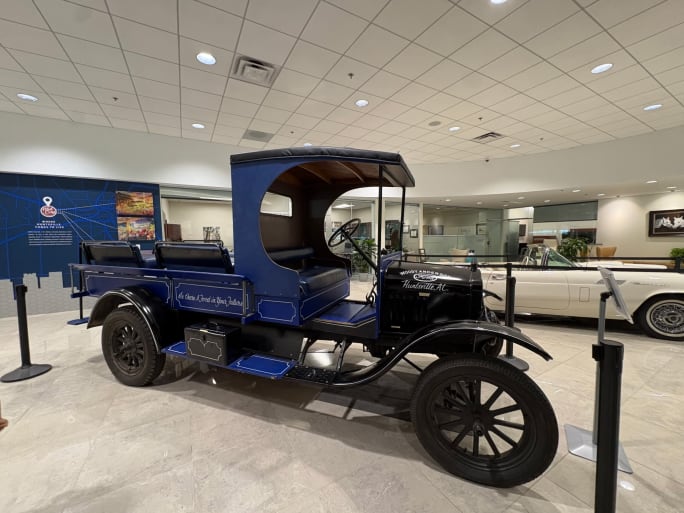 A blue 1917 Model T Ford School Bus.