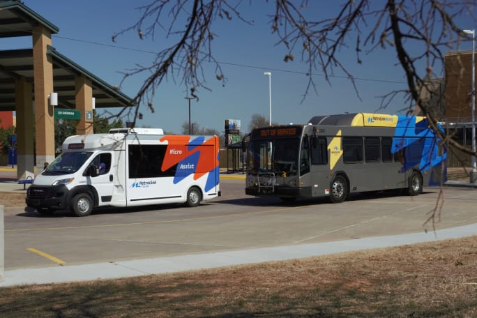 Photo of Tulsa MetroLink's transit bus and on-demand transportation vehicle.