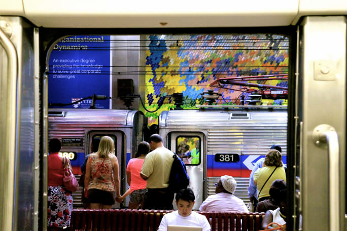 SEPTA Passengers boarding rail system