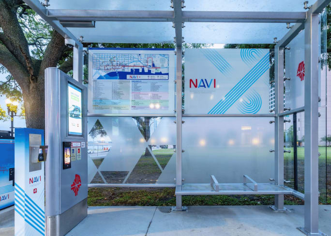 A JTA NAVI bus shelter manufactured by Tolar Manufacturing.