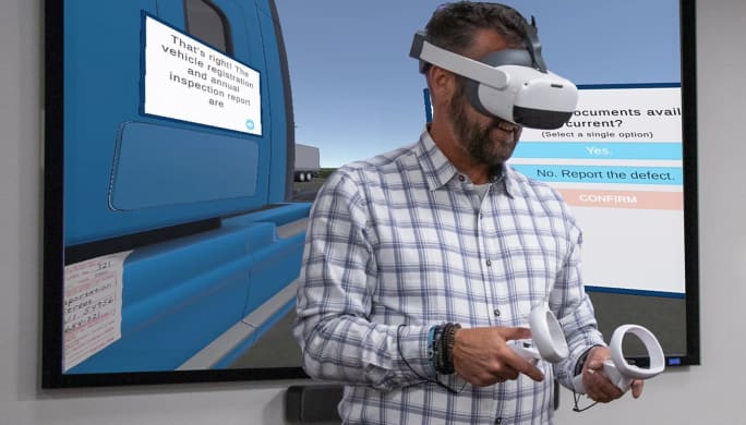 Photo of technician with VR gear on head