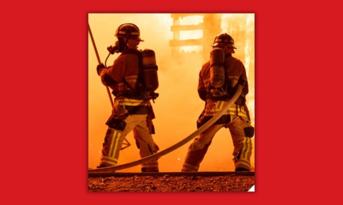 two firefighters on the frontline