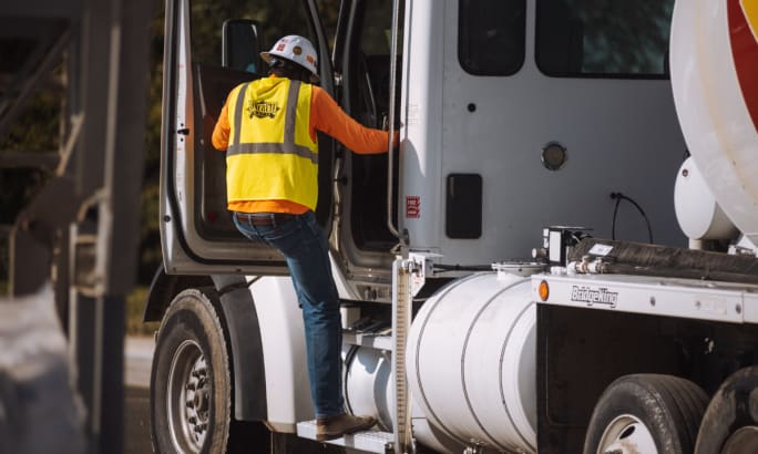 A CLD driver getting into a truck.