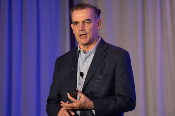 David Sargent of JD Power speaks on stage.