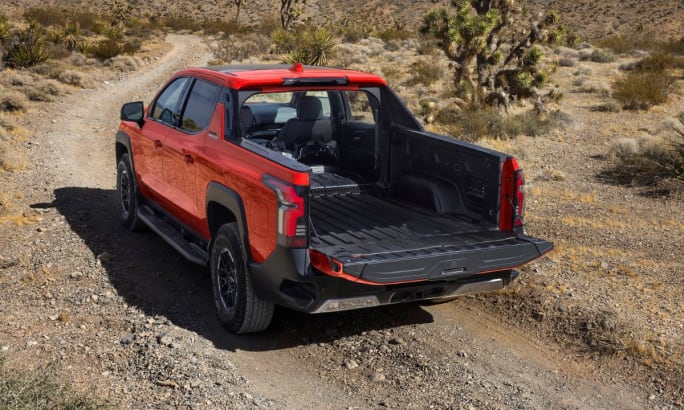 The 2026 Chevy Silverado Trail Boss  EV on a road with the 