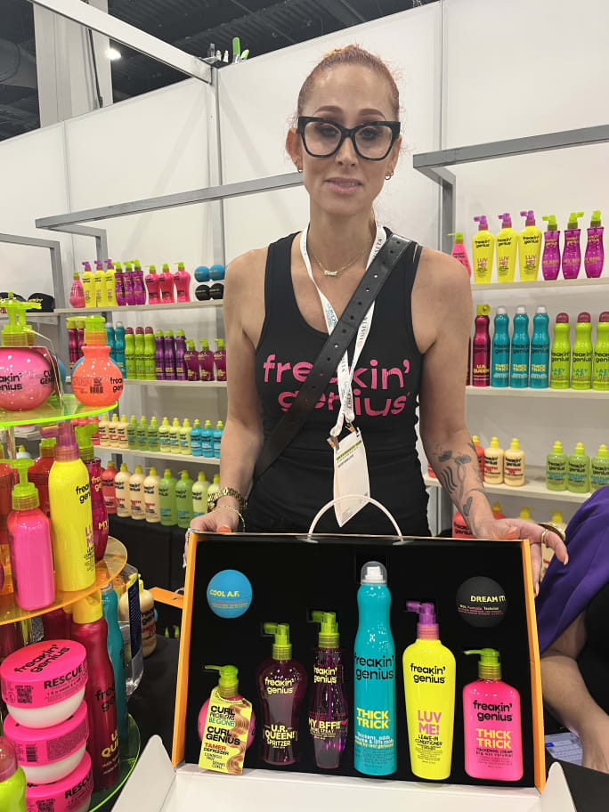 Jami Zabner at the Freakin' Genius Haircare booth, showcasing their latest launch at Cosmoprof North America 2025.Kristin Banos at the Freakin' Genius Haircare booth, showcasing their latest launch