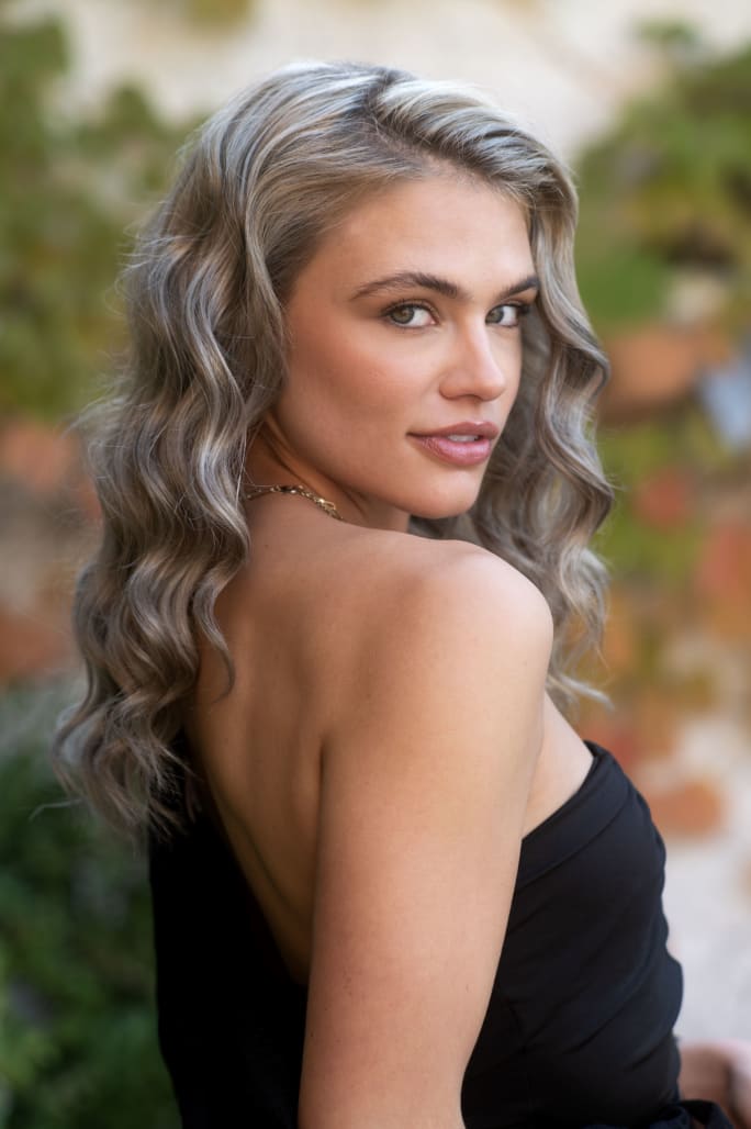 A woman with long blonde hair