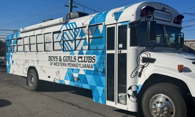 A blue and white Jerome Bettis CyberBus.