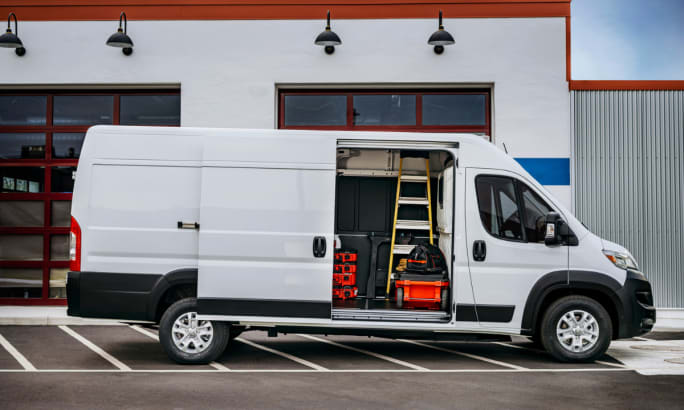 Side view of a 2025 Ram ProMaster EV with side door open.