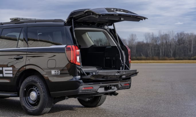 A Ford Expedition SSV is shown with the liftgate open.