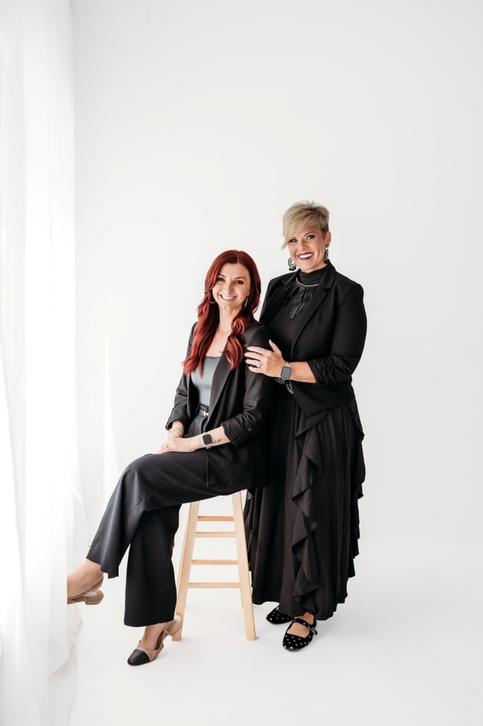 The owners of Genesis Salon and Spa in an elegant pose.