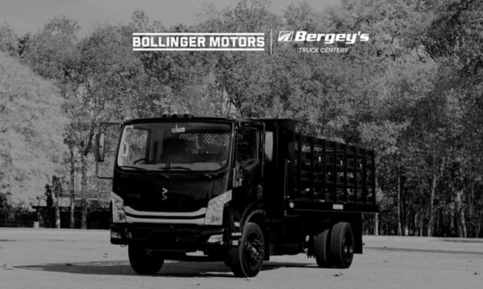A black and white photo of a Bollinger Motors B4 EV Truck with Bergey's logo.