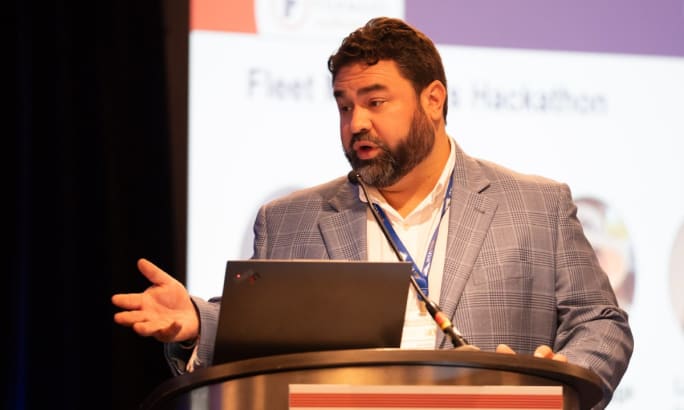 Marc Canton addresses the crowd from the podium at the recent Fleet Forward Conference.