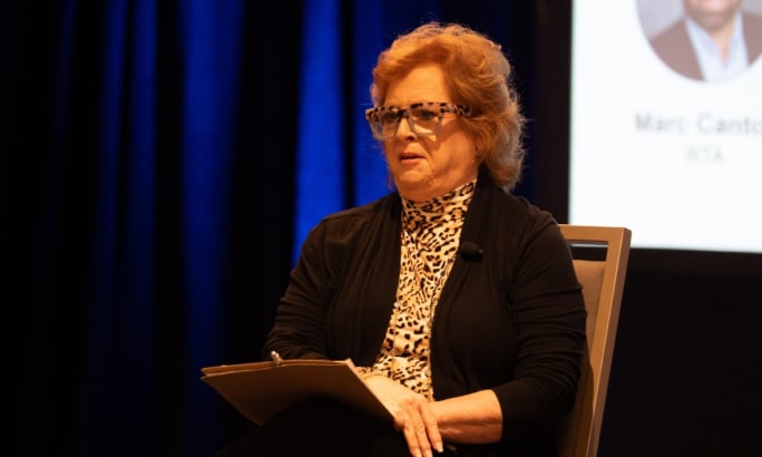 Lisa Kneggs speaking on stage during a seminar at the recent Fleet Forward Conference.