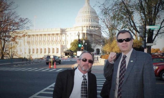 Charlie Hood and Derek Graham pose in front of the White House. 