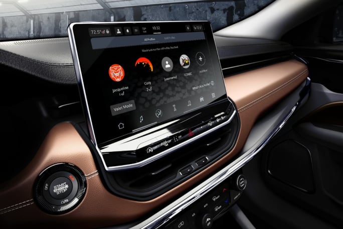 The interior of a 2025 Jeep Compass showcasing touchscreen display on the dashboard.