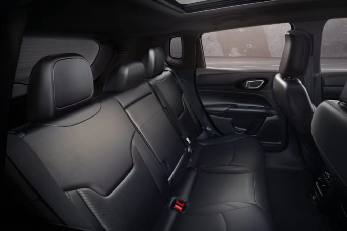 The interior of a 2025 Jeep Compass showcasing the seating and in-cabin features.
