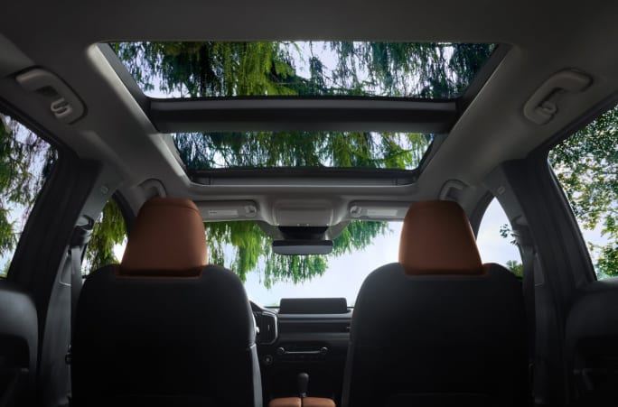Interior angle of a sunroof in a Mazda SUV.