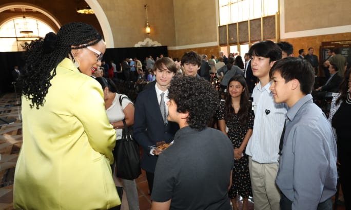 CEO Stephanie Wiggins speaking with students at the State of the Agency event.