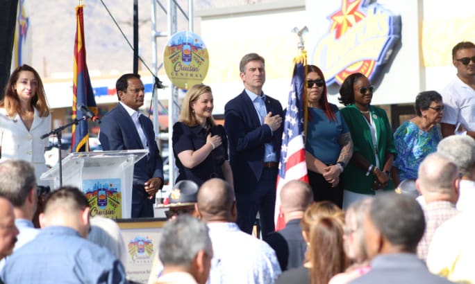 People standing on a stage. 