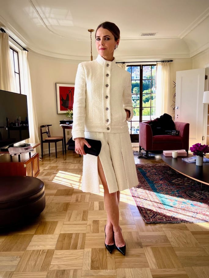 A woman in a chic outfit.