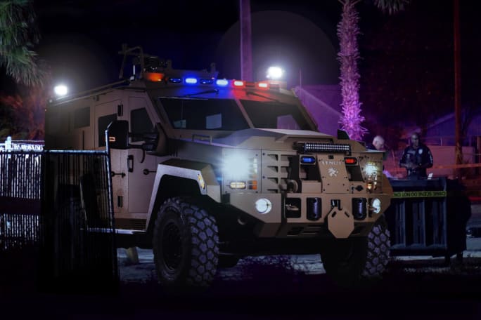 A Lenco Bearcat armored vehicle is shown with lights activated.