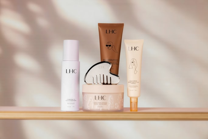 a group of LHC hair product packaging in neutral colors