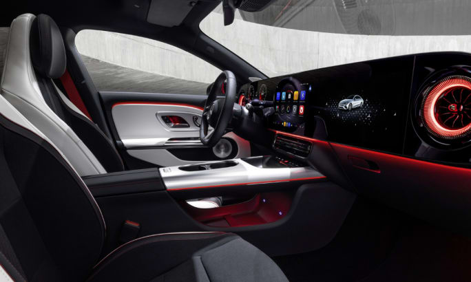 Red and black interior of a 2026 Mercedes CLA sedan.