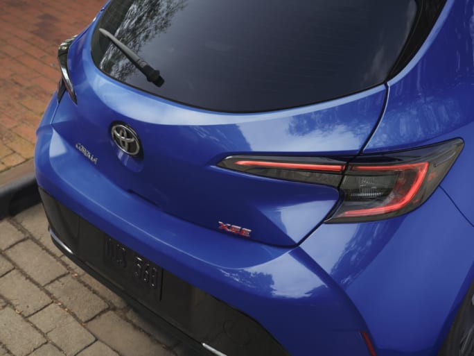 The back hatch of a blue 2025 Toyota Corolla Hatchback.