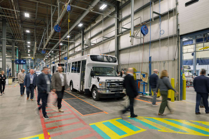 people walk around inside the new micro bird building in new york