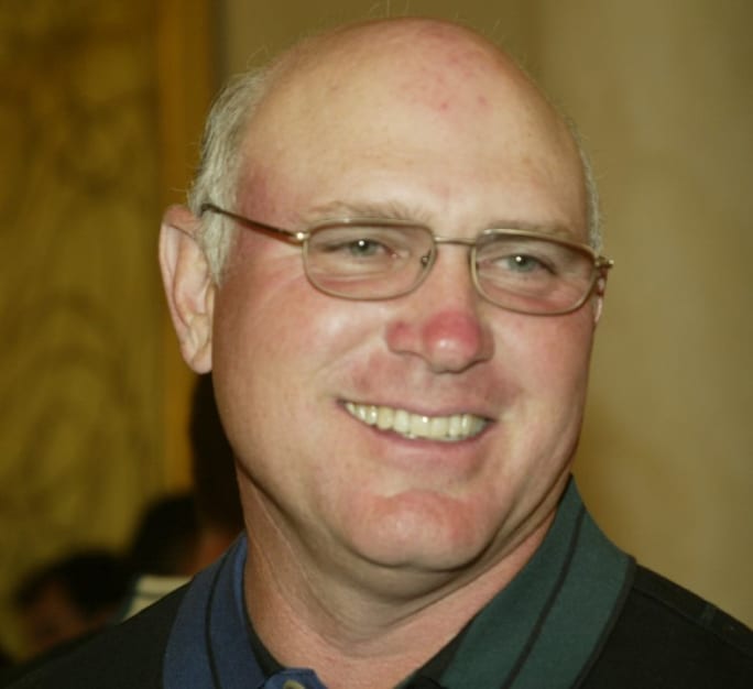Up close portrait of Bill Gibson smiling.