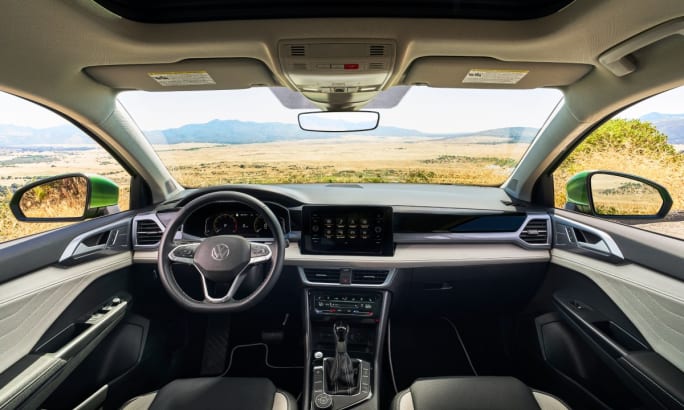 2025 Volkswagen Taos front cab interior looking out of the windshield.