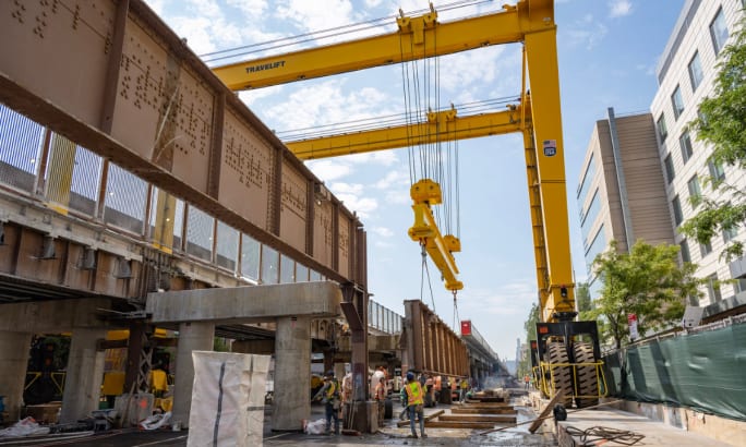 Image of crews working with the gantry system to replace parts of the Park Avenue Viaduct.