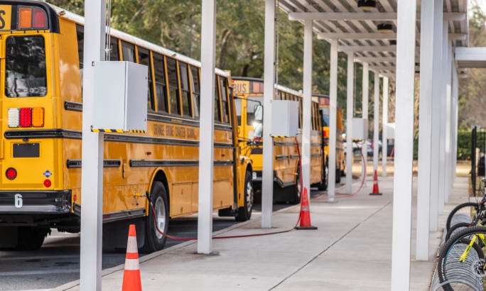Orange Grove Charter School buses fueling.