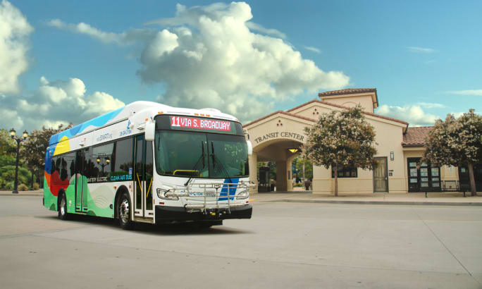 A SMRT bus outside of a transit center.