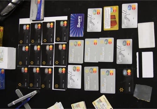 Thieves take a blank credit card, emboss it with a name matching a driver's license and load a victim's information onto the magnetic stripe. Photo courtesy of OCATT.