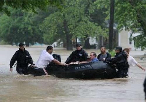 Nashville Police officers used military surplus boats to rescue residents during severe flooding in 2010. Photo courtesy of NPD.