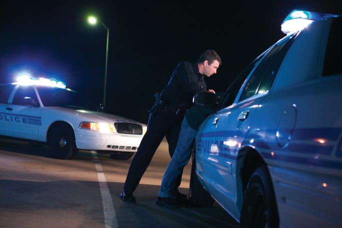 When you take someone into custody, be careful about how you position them. Certain restrained positions can restrict breathing and lead to the tragedy of in-custody death. [|CREDIT|]Photo: Getty Images