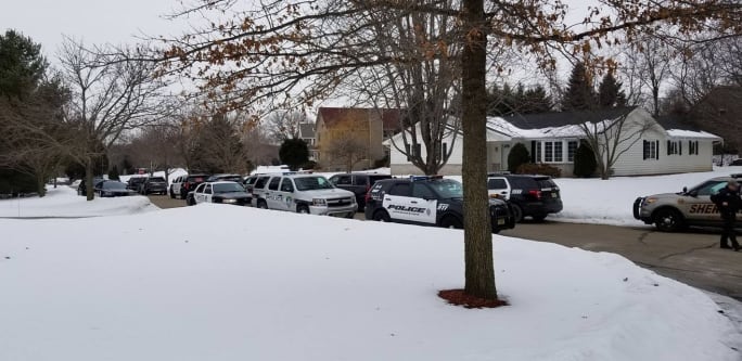 K-9 units from all over Wisconsin visited with termanally ill seven-year-old Emma Mertens. [|CREDIT|]Image courtesy of Hartford PD / Facebook.