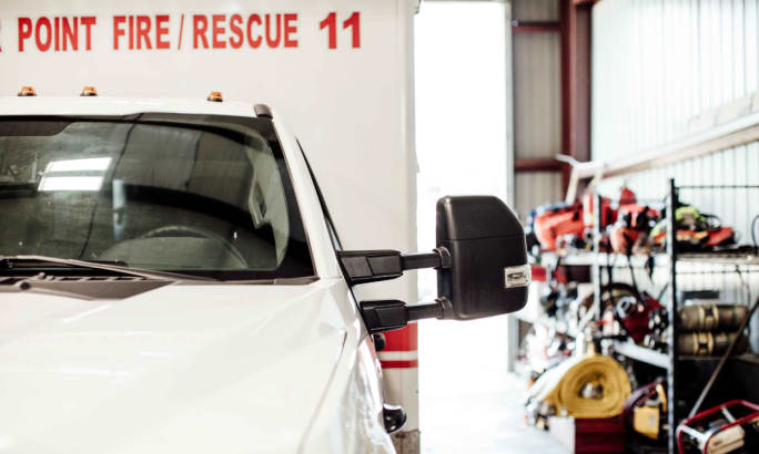 Emergency vehicle sitting in bay.